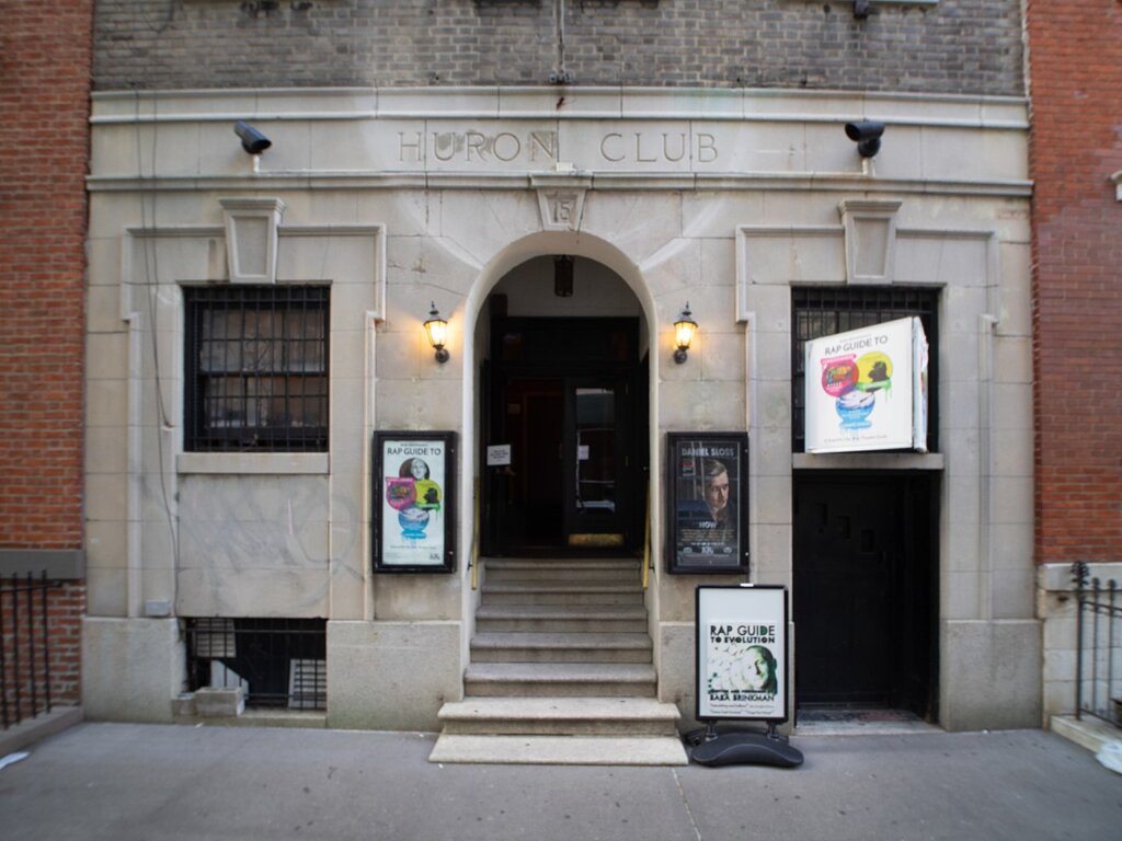Exterior of the Huron Club in Edinburgh, Scotland with Fringe posters on display outside